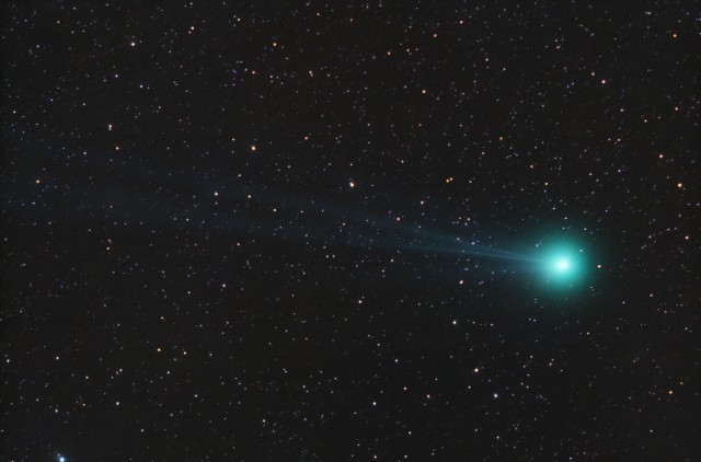 Comet Lovejoy Q2 taken with a Canon 200mm F/2.8 telephoto lens. 24x120 sec @ ISO 1600, 72mm Lumicon Deep Sky Filter, Canon XS (modified.)