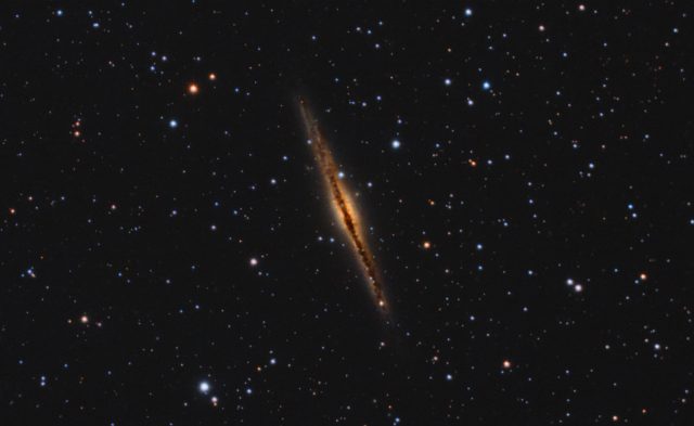 NGC 891. Combined data from two telescopes and 3 data sets - a C8 image and two SN6 images.