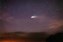 Clouds add color to Hale-Bopp View